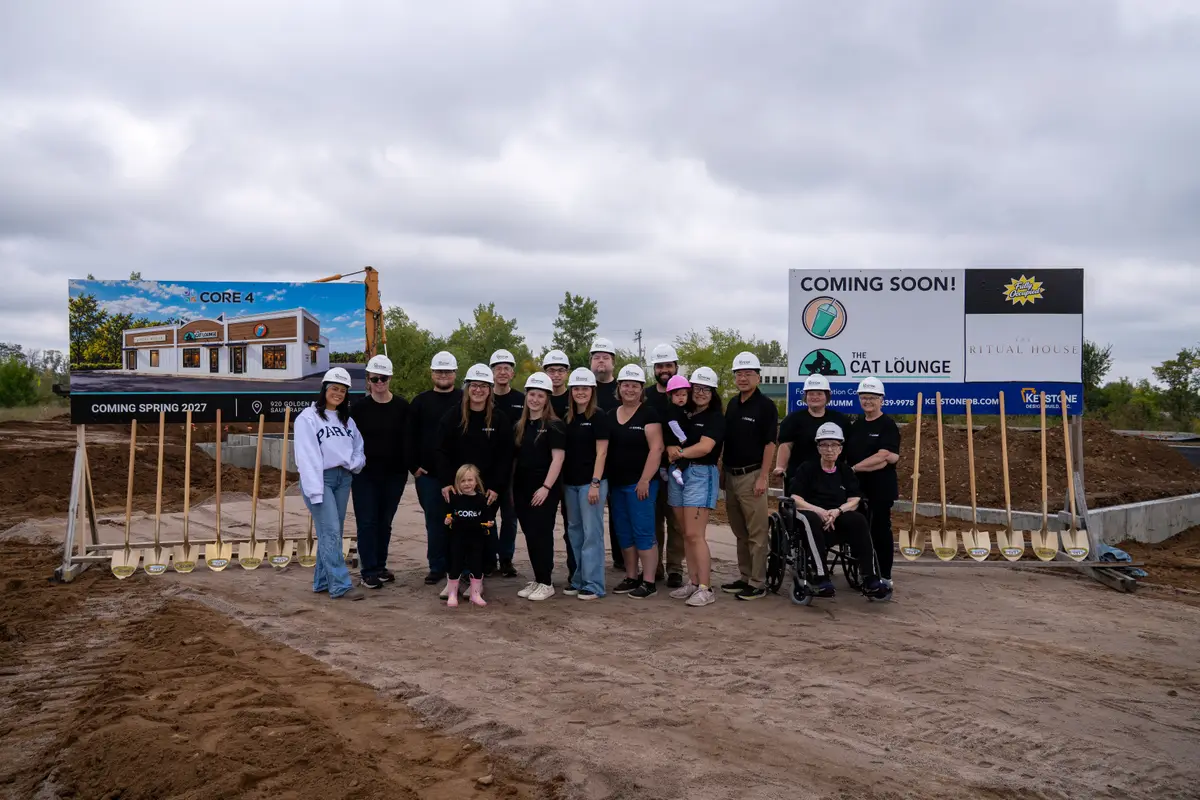 Core 4 groundbreaking guests lined up with shovels