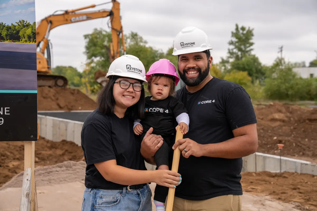 A family at the Core 4 groundbreaking