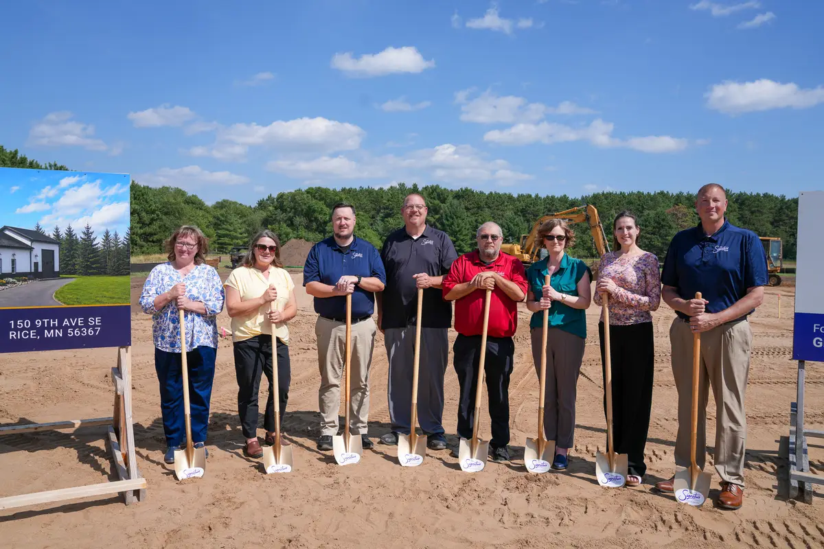 MN Signature Care groundbreaking guests lined up with shovels