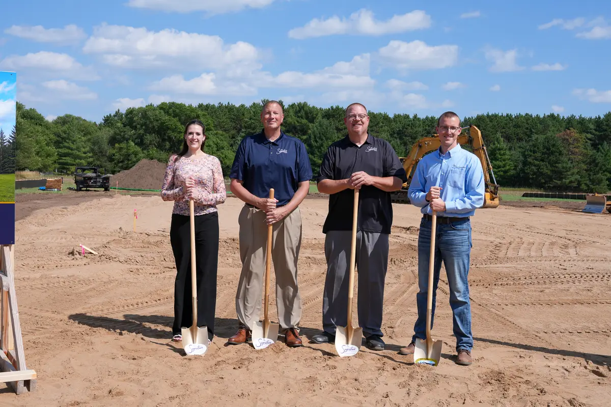 Guests with shovels at the MN Signature Care site